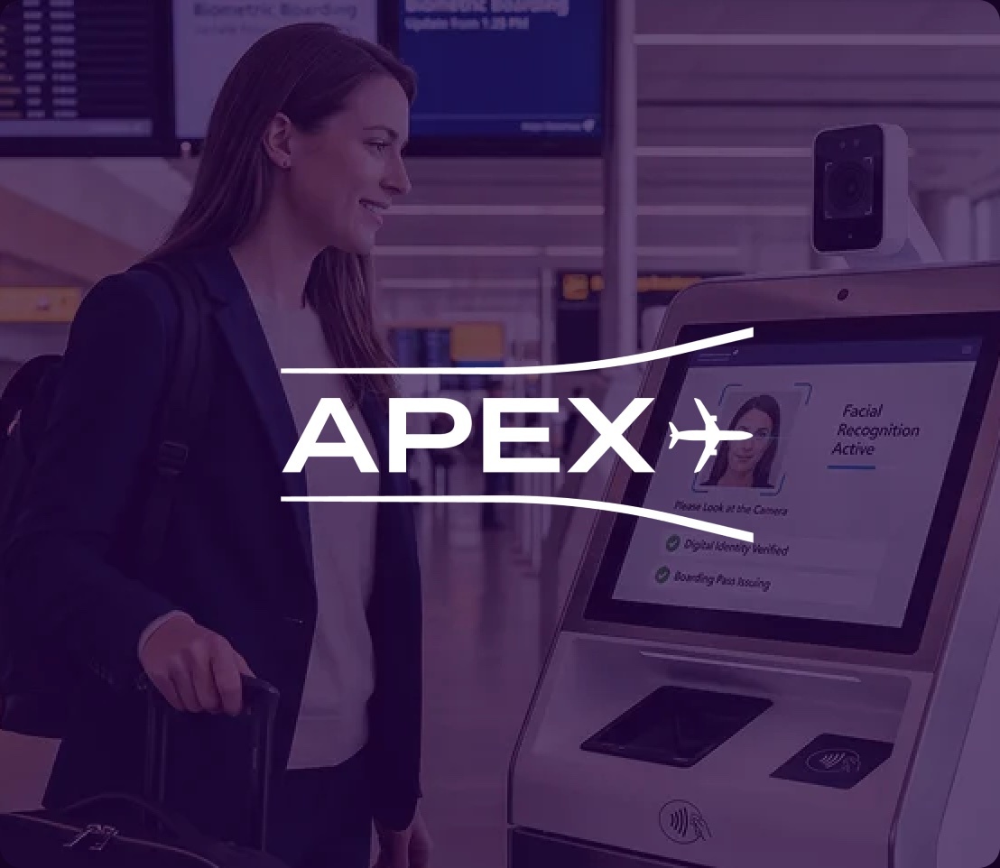 Traveler at a biometric check-in kiosk with facial recognition