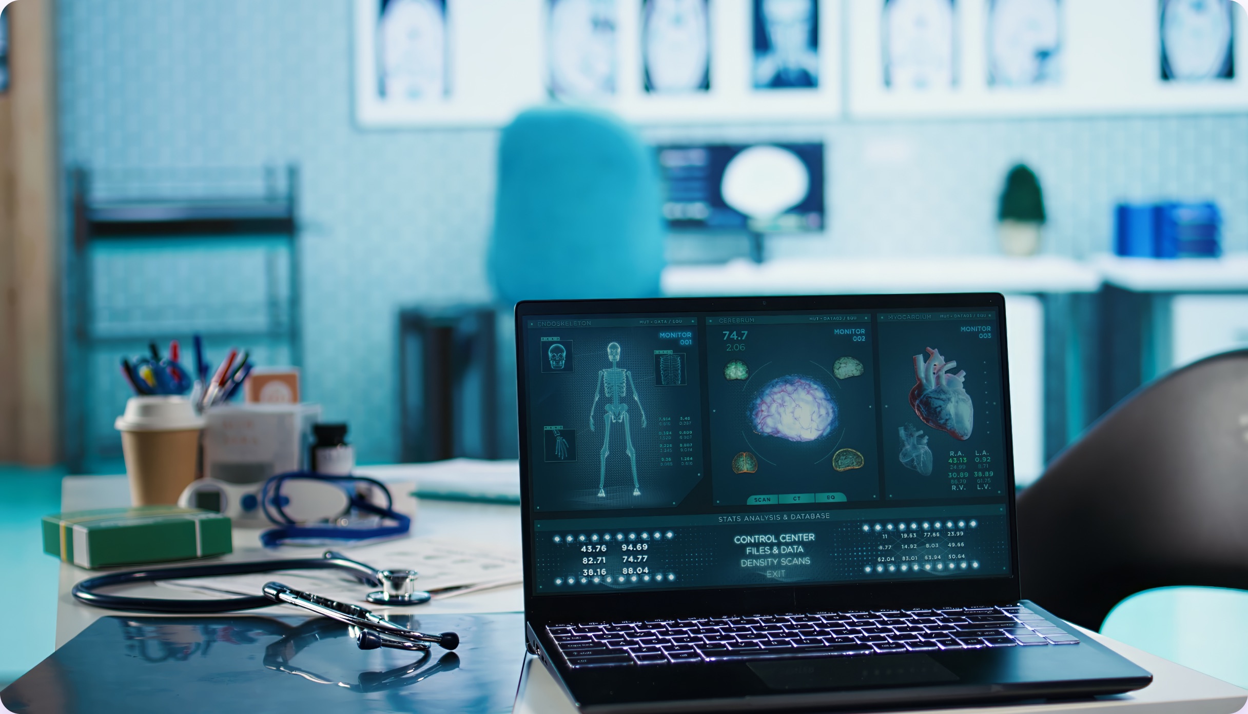 Laptop showing a medical dashboard on a physician's desk