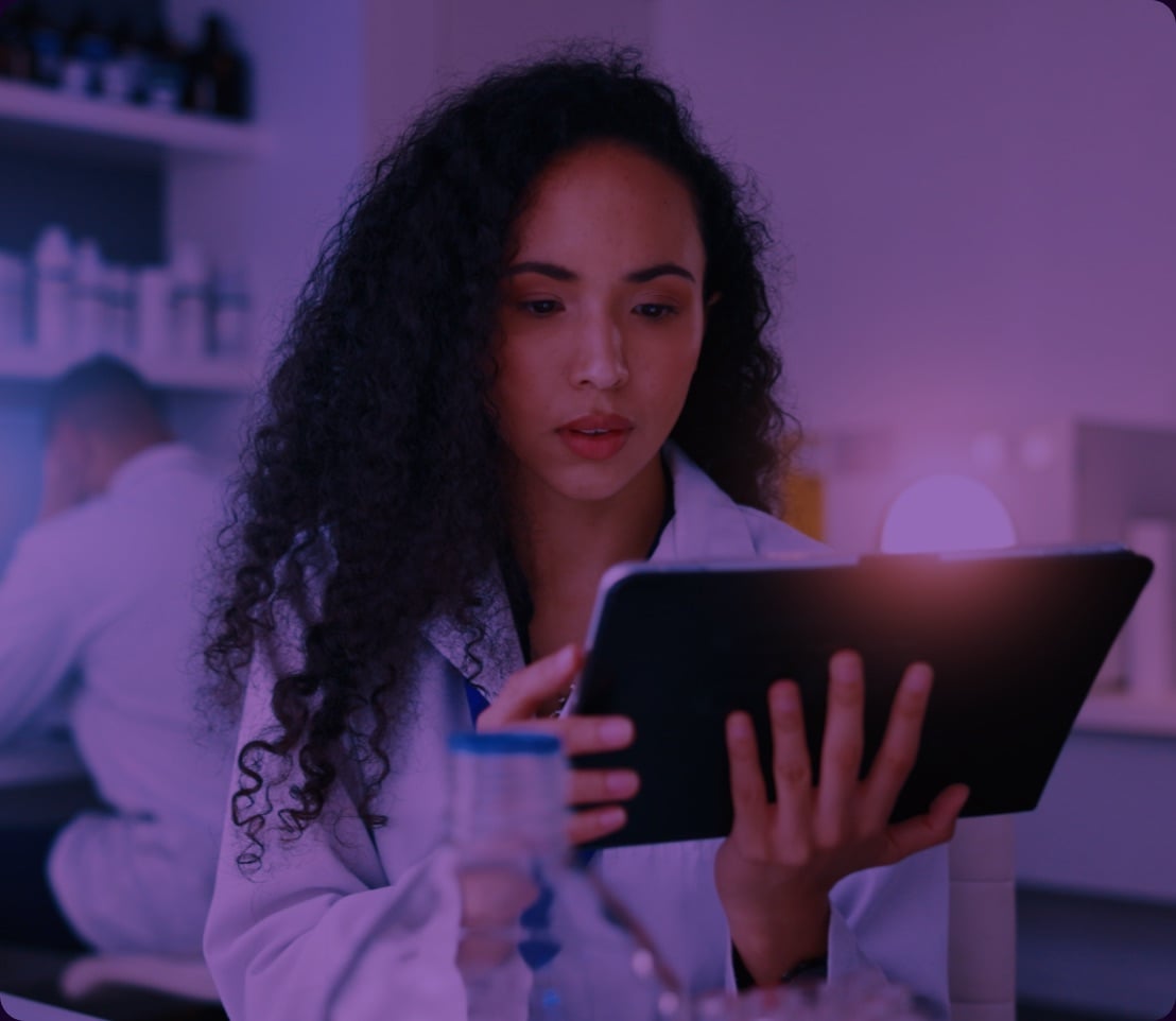 Physician reviewing patient recovery data on a tablet